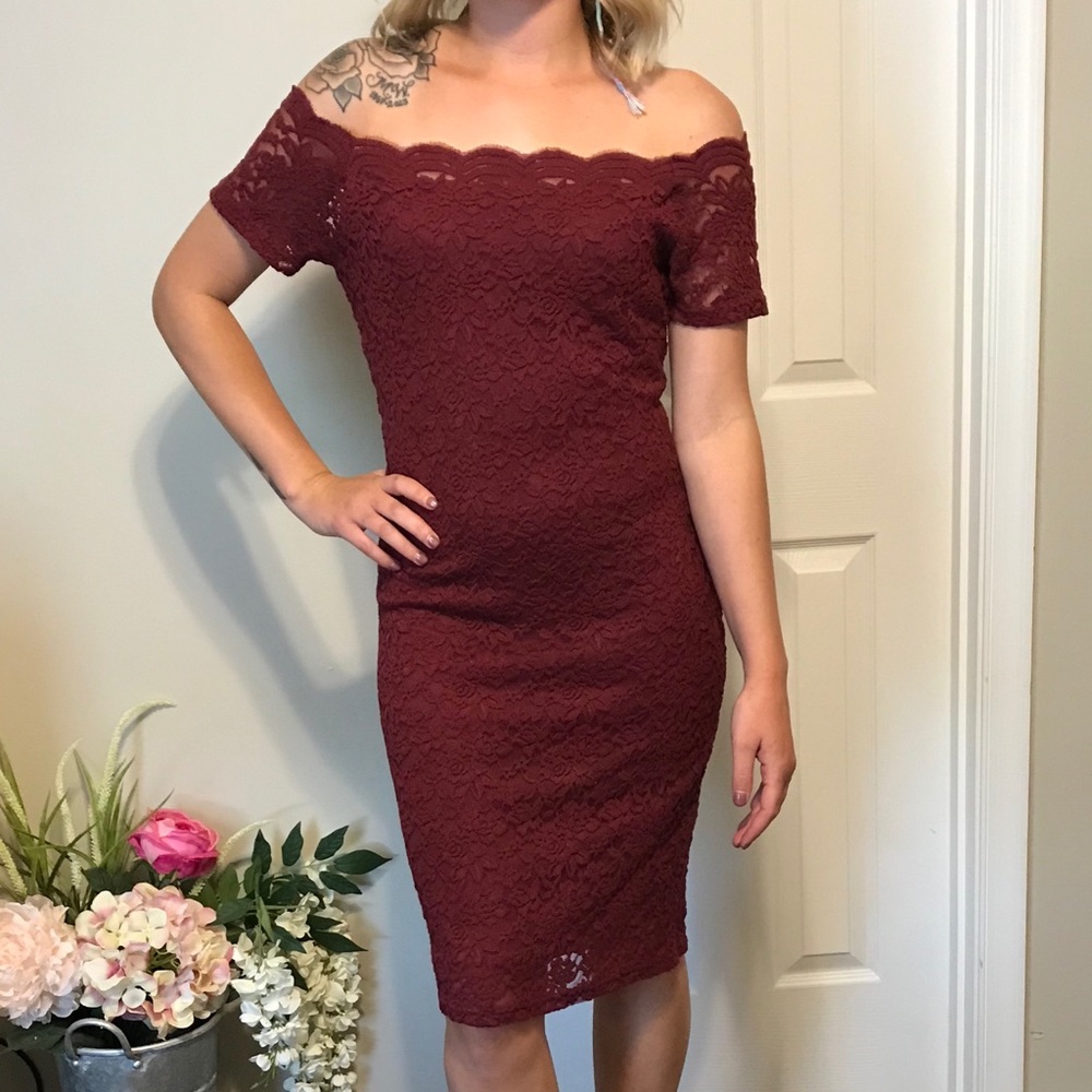 Burgundy, knee length lace dress.